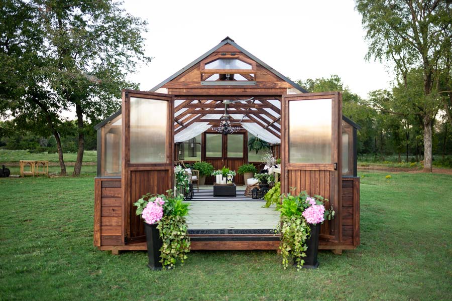 Front exterior view of a 12x32 Legacy Yoderbilt Greenhouse