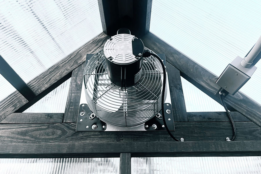 Rear exhaust fan in an 8x16 Yoderbilt Greenhouse