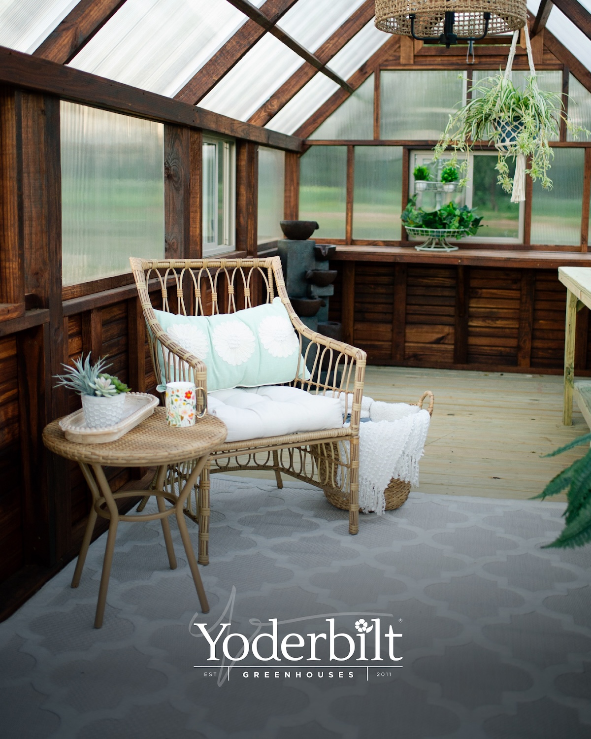 Yoderbilt greenhouse interior view with a Yoderbilt logo overlay